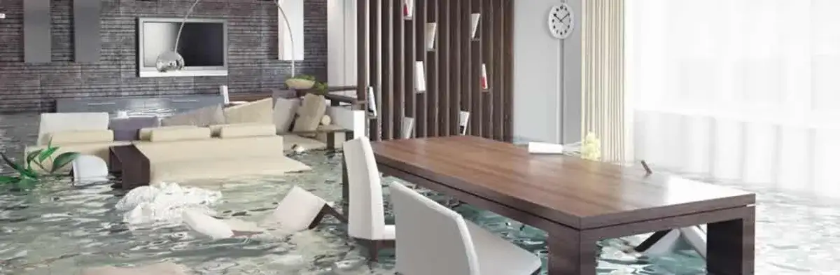 home interior affected by water damage with flooded floors and displaced furniture in Glendale, AZ